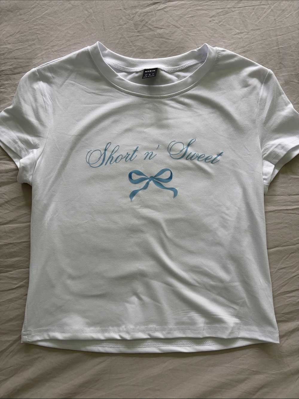 SHEIN White Short Sleeve Tee with Light Blue Script & Bow